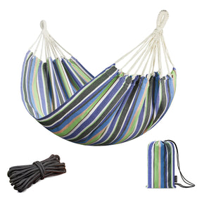 JoyView Brazilian hammock fully set up in blue and green stripes for patio relaxation.