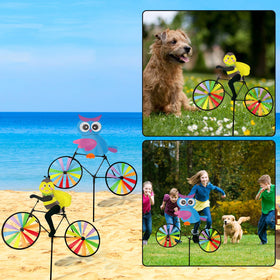 Outdoor garden scene with Jremreo animal pinwheels in color.
