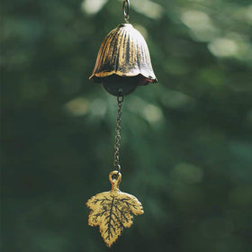Jsacemxi iwachu-cast-iron bless temple bell demonstrates durable outdoor charm.
