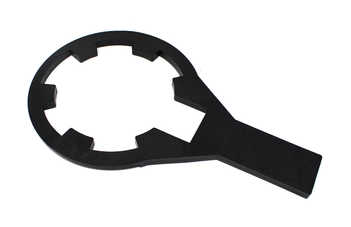 Closeup of the durable premium plastic wrench designed for pool maintenance