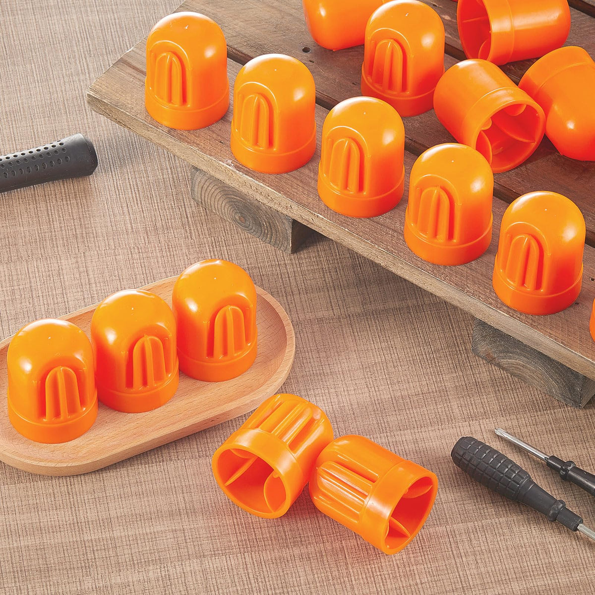 Juexica orange caps on fence posts boost visibility and boundary marking.