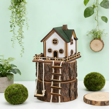 JULEASEL Fairywood Mini Treehouse front deck with chairs enhances plant display.