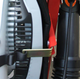 Jungle Jim's 2-Backpack Blower Rack in use on a trailer secures gear.