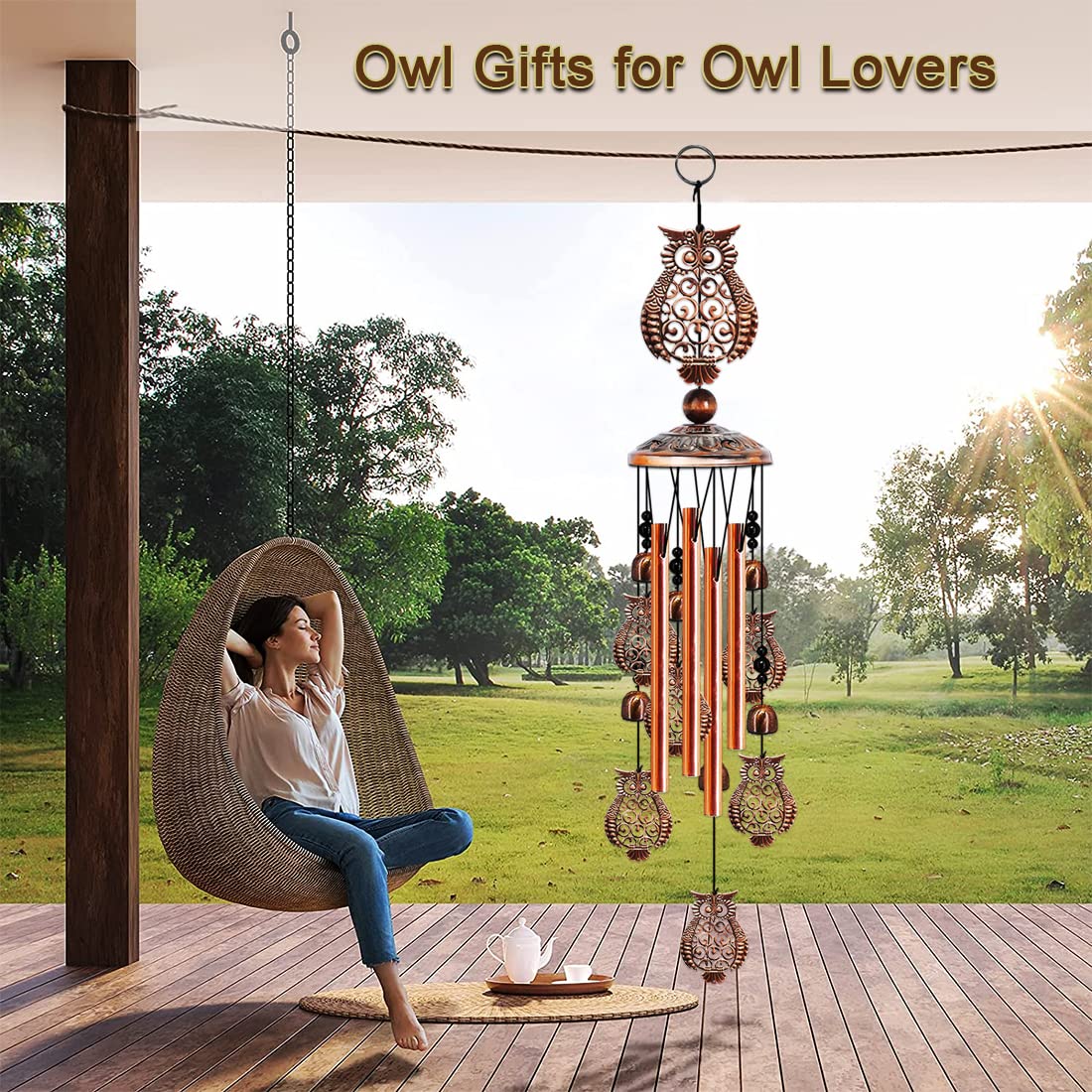 JUNQIU Owl Wind Chimes on patio offer peaceful outdoor soundscape.