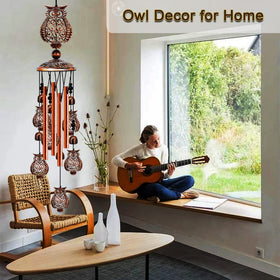 JUNQIU Owl Wind Chimes on porch provide serene, harmonious tones.