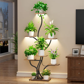 JUSTOGO plant stand with branch design showcases greenery in a modern living room.