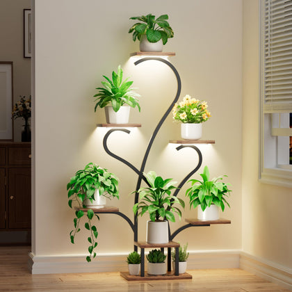 JUSTOGO plant stand with grow lights highlights vibrant greenery in a living room
