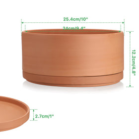 Close-up of the JUXYES terracotta pot showing the drainage hole and natural texture.