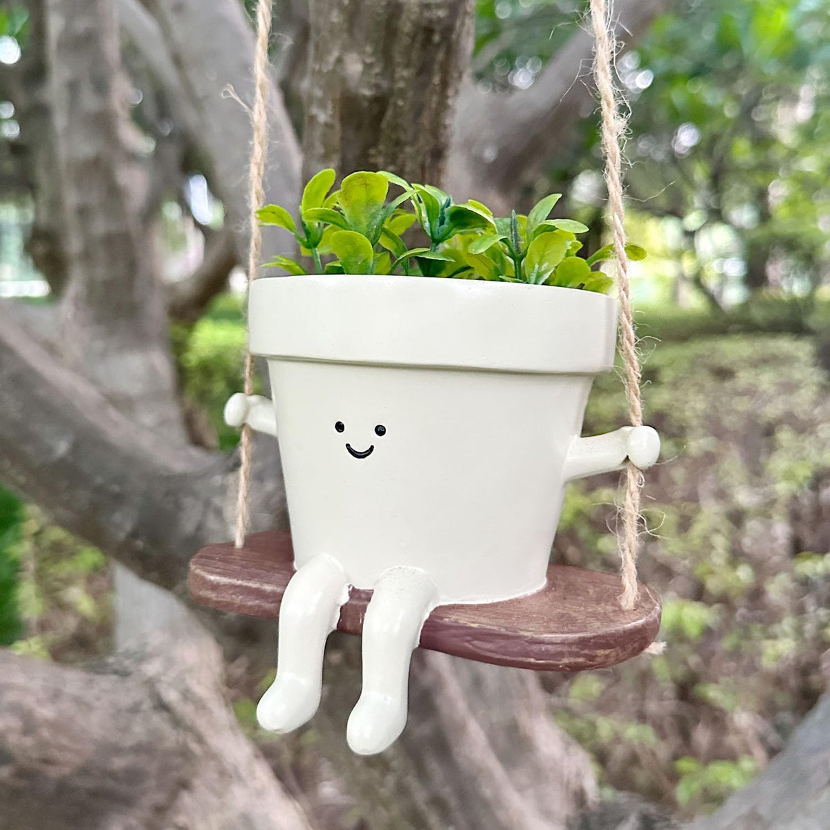 Jxcnkiy planter with rope and hooks for easy hanging setup.