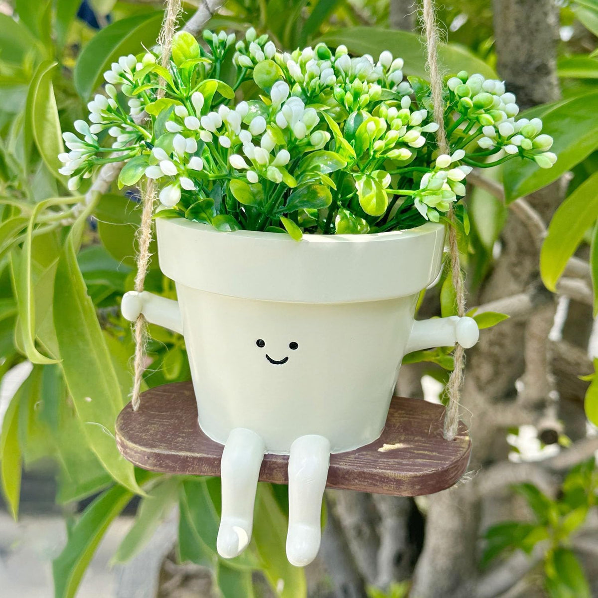 Jxcnkiy swing smiley face planter hanging for cheerful indoor or outdoor decor.