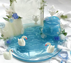 Jxpinet lightweight swan statue for craft projects or mini terrariums.
