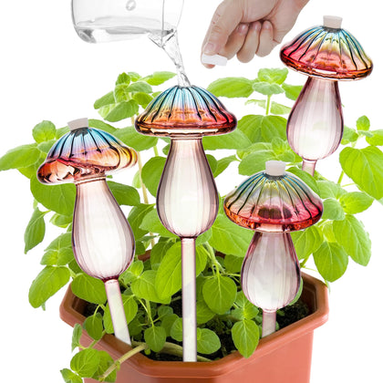 Kaimfdg mushroom watering globe with rainbow finish enhances indoor plant decor.