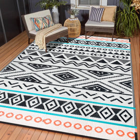 Kalafun outdoor rug with plastic straw texture, ideal for quick setup on patios.