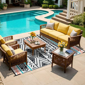 Kalafun versatile rug for picnics and RV sites, stays flat on surfaces.