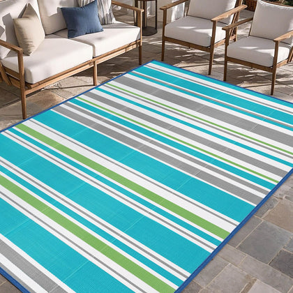 Kalafun outdoor rug in turquoise-grey for patios, durable and easy to clean.