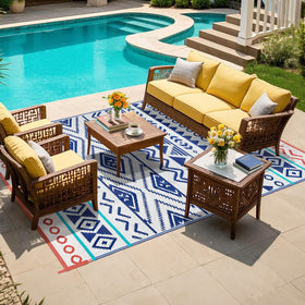 Kalafun RV outdoor mat beside an RV for al fresco lounging.