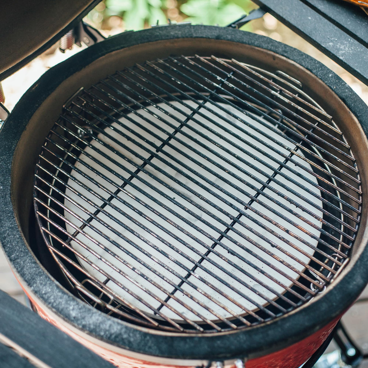 Kamado Joe indirect cooking accessory enhances flavor and control.