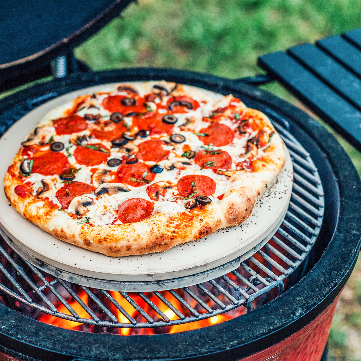 Kamado Joe KJ-PS23 pizza stone crisp crust in action during bake