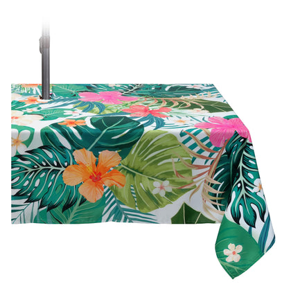 Kamoor palm leaves tablecloth protecting outdoor dining surfaces.