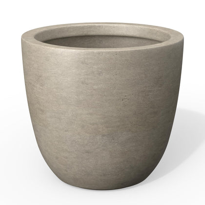 Kante 10-inch round concrete planter buff finish with visible pores for modern indoor-outdoor style.