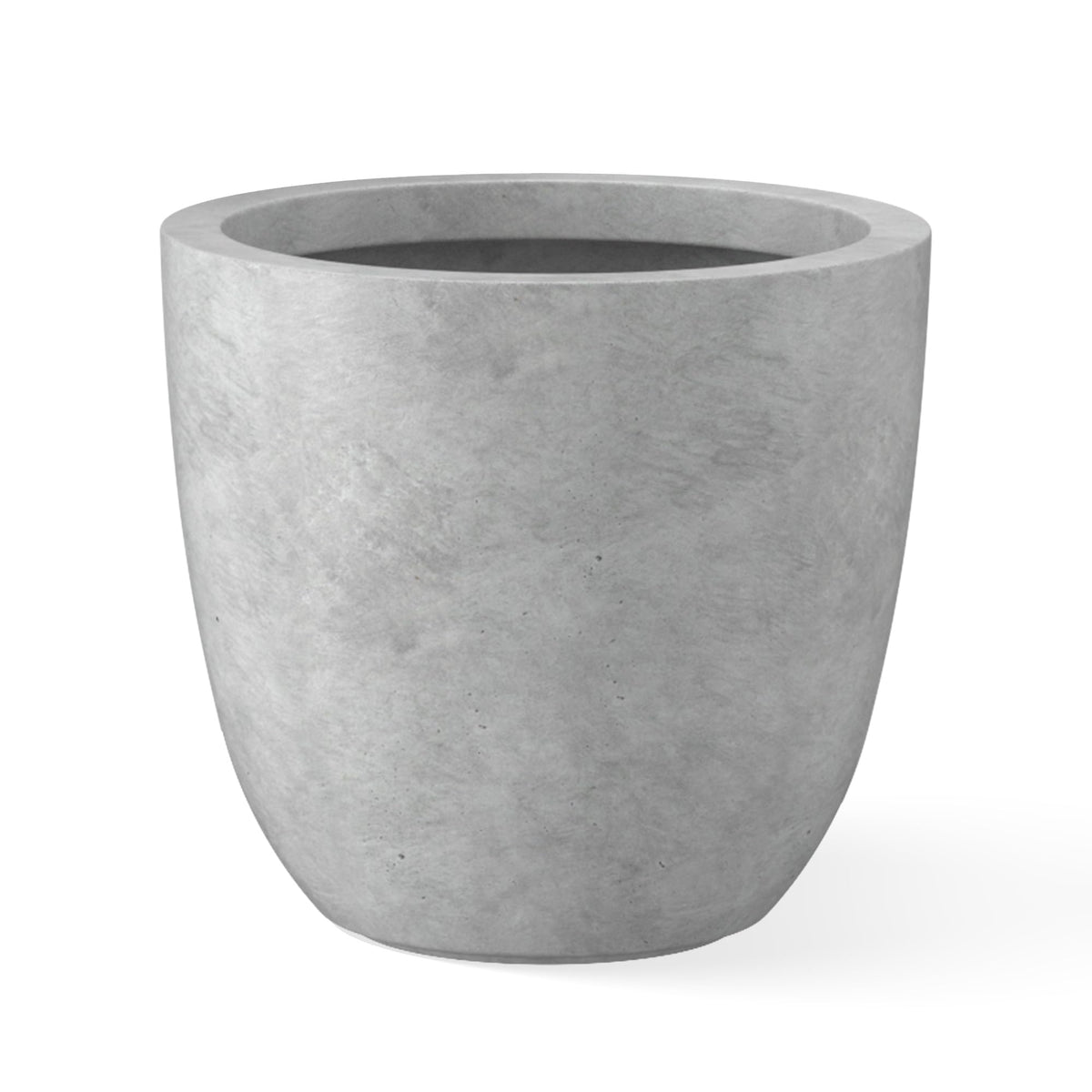 Kante 10-inch round concrete planter for stylish indoor and outdoor display.