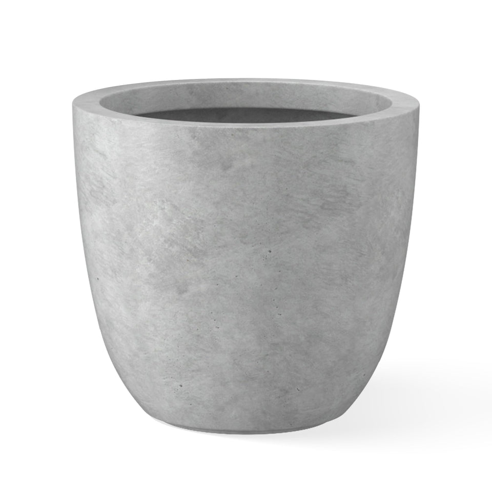 Kante 10-inch round concrete planter for stylish indoor and outdoor display.
