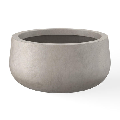 Kante 11.8-inch round concrete planter exterior view showcases a modern curved silhouette