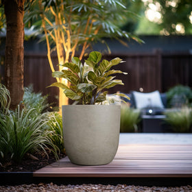 Kante 16.5-inch round concrete planter drainage hole with plug for flexible use.