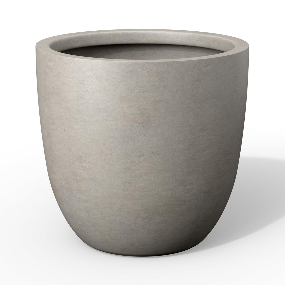 Kante 18-inch round concrete planter, front view, spacious planting area for modern spaces