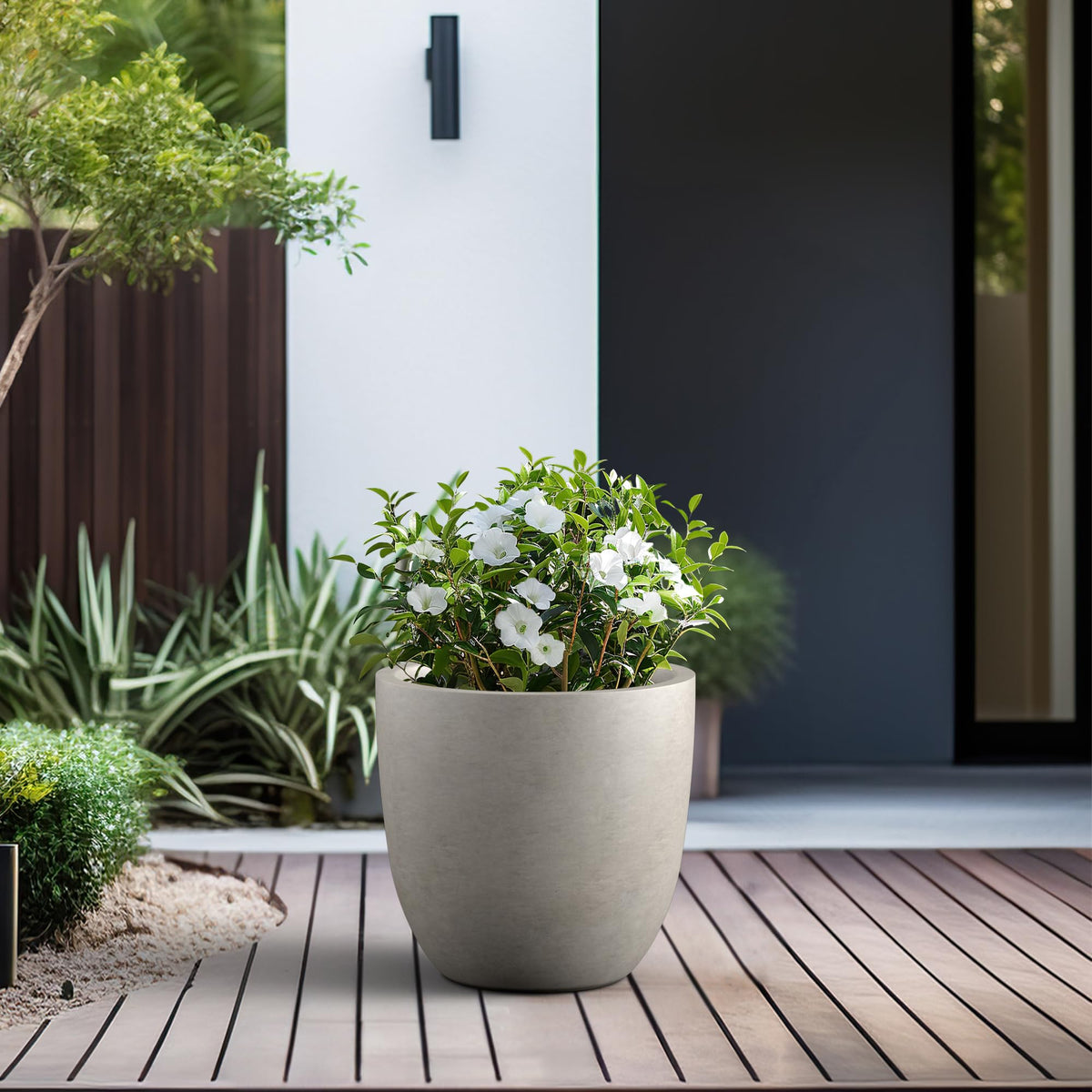 Kante 18-inch round concrete planter, rubber plug included for indoor outdoor flexibility