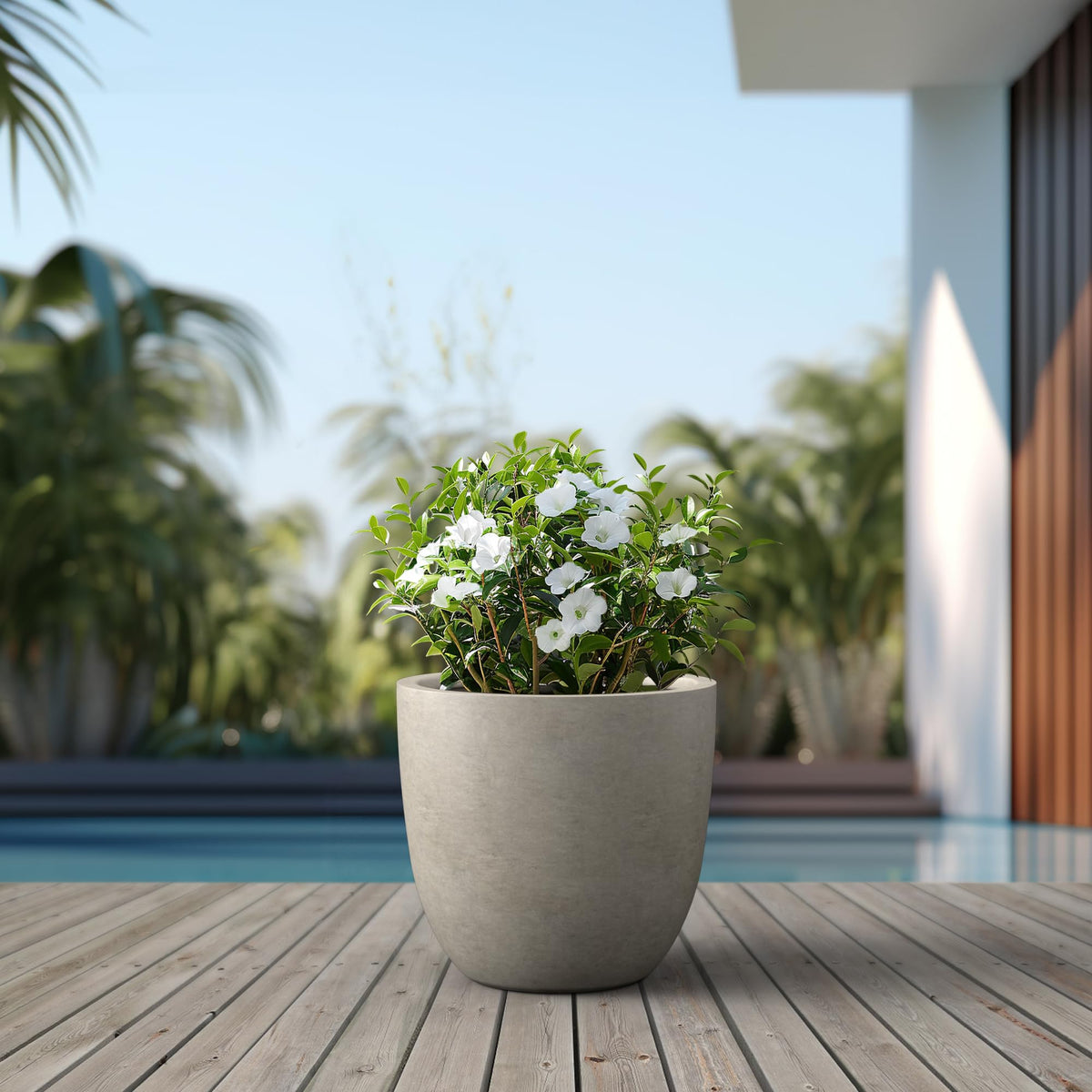 Kante planter includes rubber plug for indoor or outdoor moisture management.