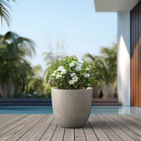 Kante planter includes rubber plug for indoor or outdoor moisture management.