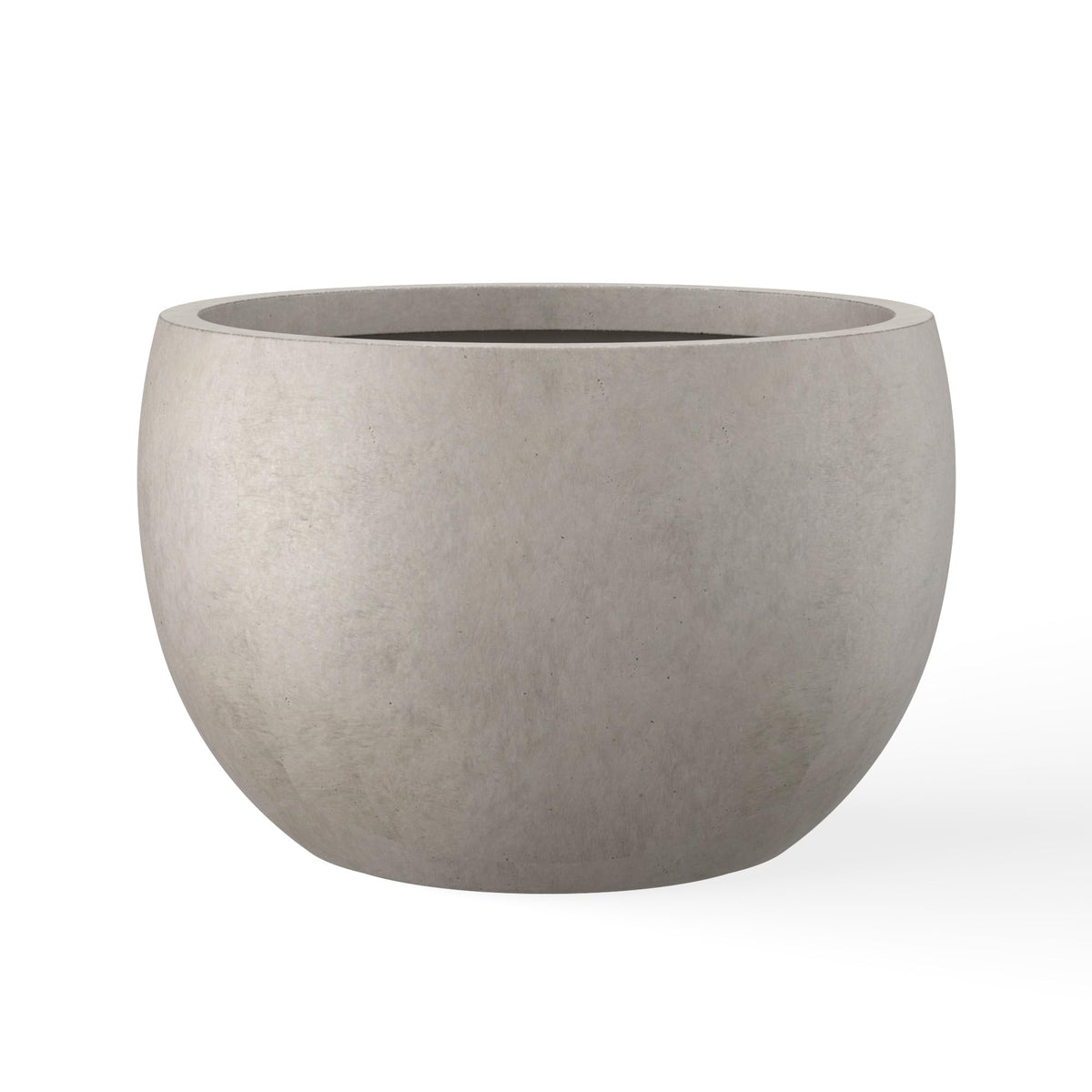 Kante 19-9 inch round concrete planter with textured finish for contemporary outdoor spaces