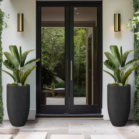 Kante 24-inch round concrete planter drainage hole enables healthy watering in indoor and outdoor setups.