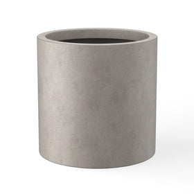 Kante 9.8-inch round concrete planter with drainage hole for indoor or outdoor use.