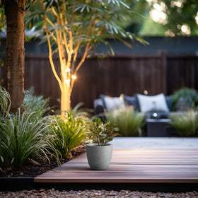 Kante planter features a charcoal finish with visible pores for industrial appeal.