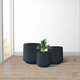 Kante charcoal round planter close-up reveals textured surface and durability.
