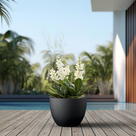 Kante planter on garden patio demonstrates easy outdoor integration.