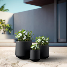 Kante contemporary planter with smooth curves enhancing modern decor