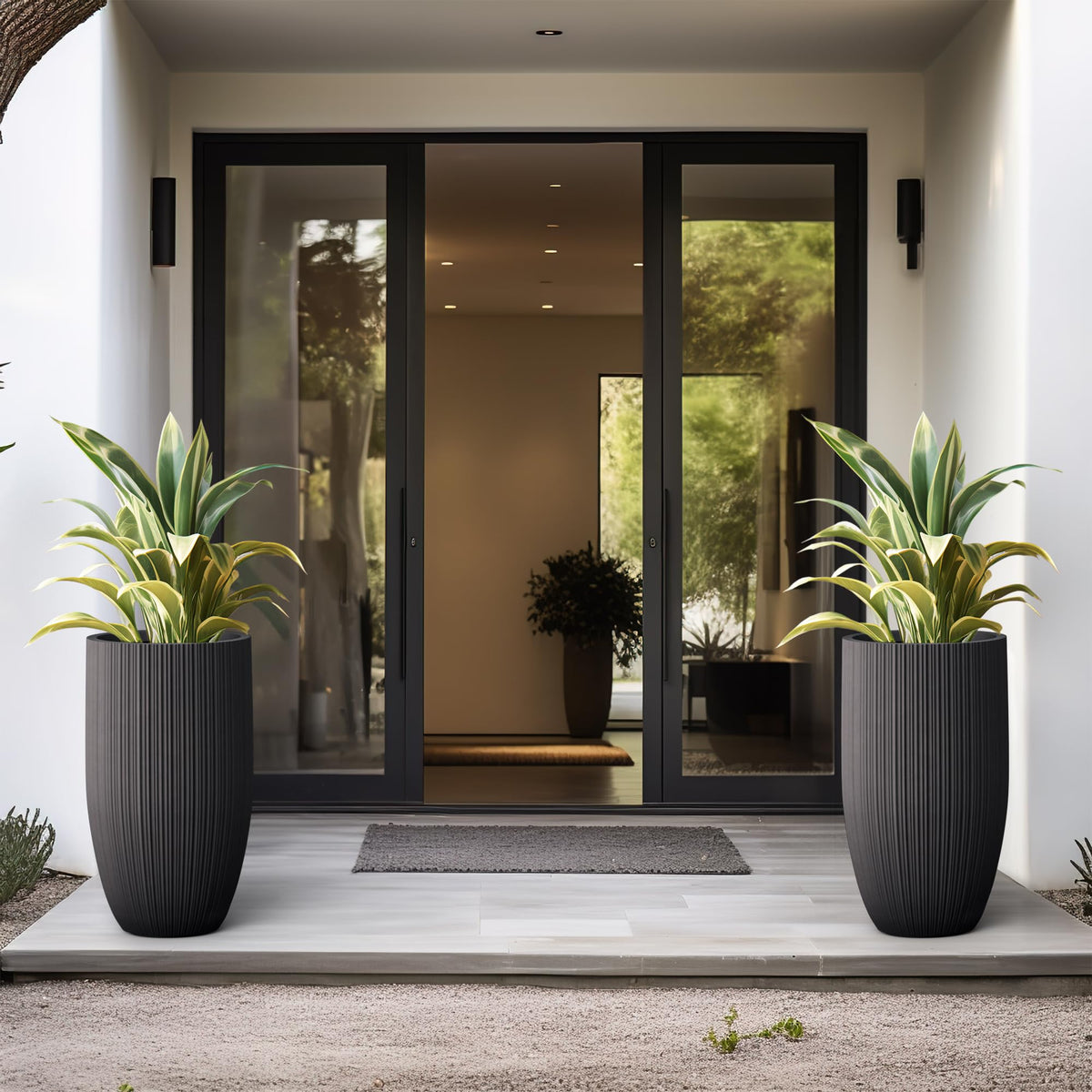 Kante large indoor-outdoor planter with rubber plug for drainage control.