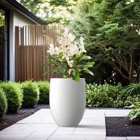 Kante large outdoor indoor planter with rubber plug for flexible placement.