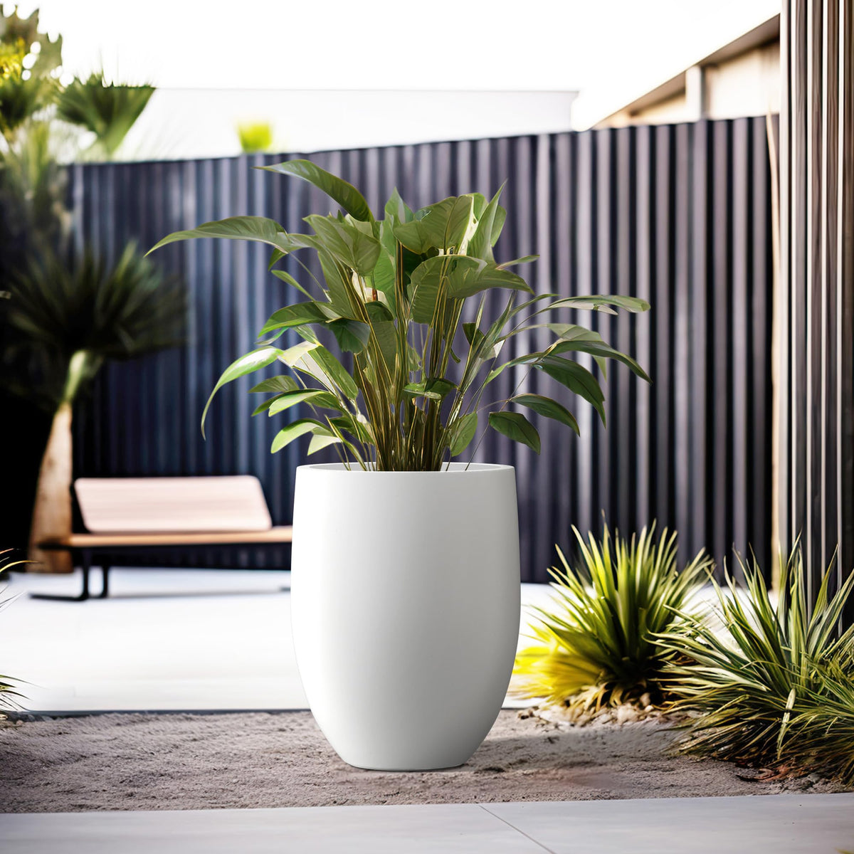 Kante lightweight concrete planter is easy to move without sacrificing durability.