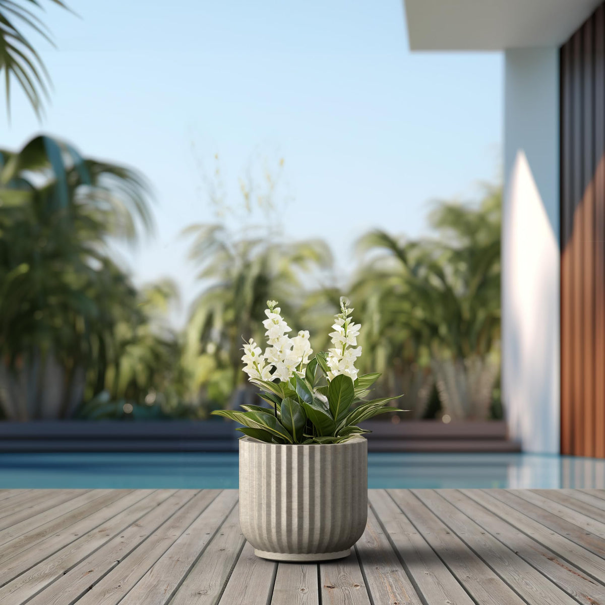 Kante modern round planter with fluted detail for stylish spaces.