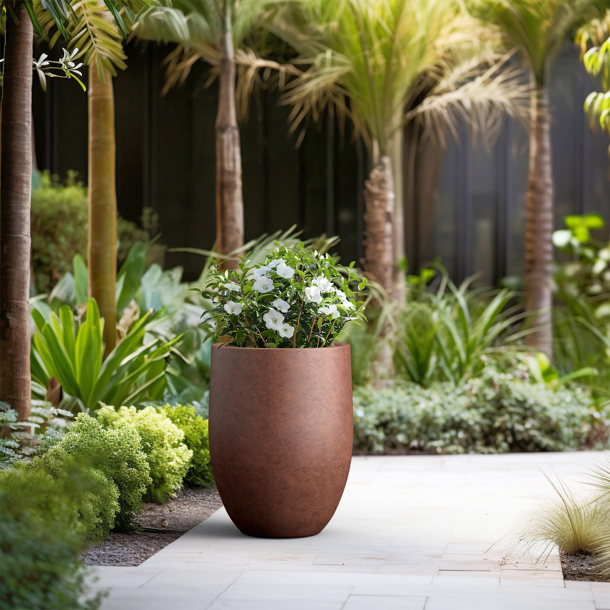Kante planter showing drainage hole with rubber plug for indoor-outdoor use.