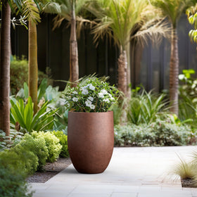 Kante planter showing drainage hole with rubber plug for indoor-outdoor use.