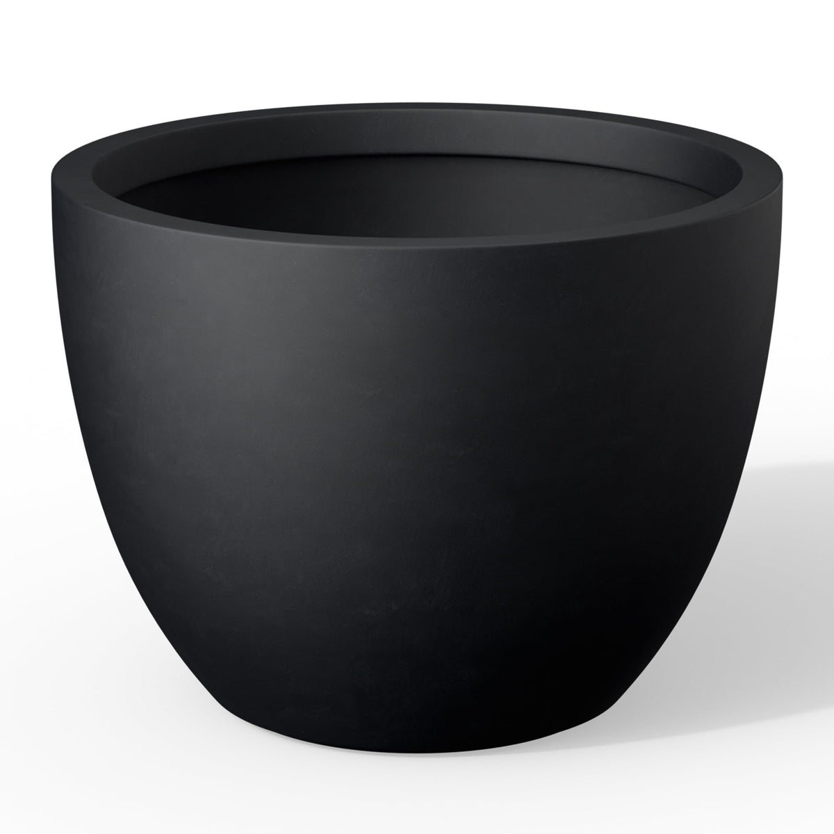 Kante round concrete planter front view with modern porous finish for indoor or outdoor decor.