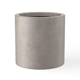 Kante round concrete planter front view, ideal for indoor or outdoor styling.