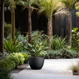 Kante round planter porous finish adds natural texture for any space.
