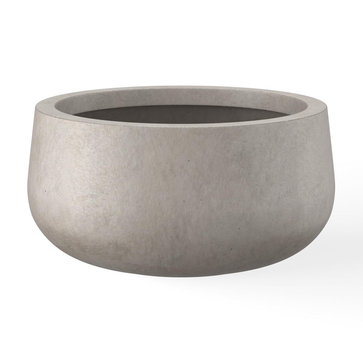 Kante round concrete planter surface shows modern texture for stylish interiors.