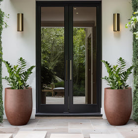 Kante weather-resistant fiberglass-concrete planter withstands sun and rain.